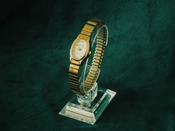 Sharp gold watch